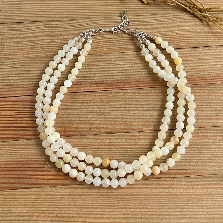 Belleair Babe white gemstone glam triple strand necklace